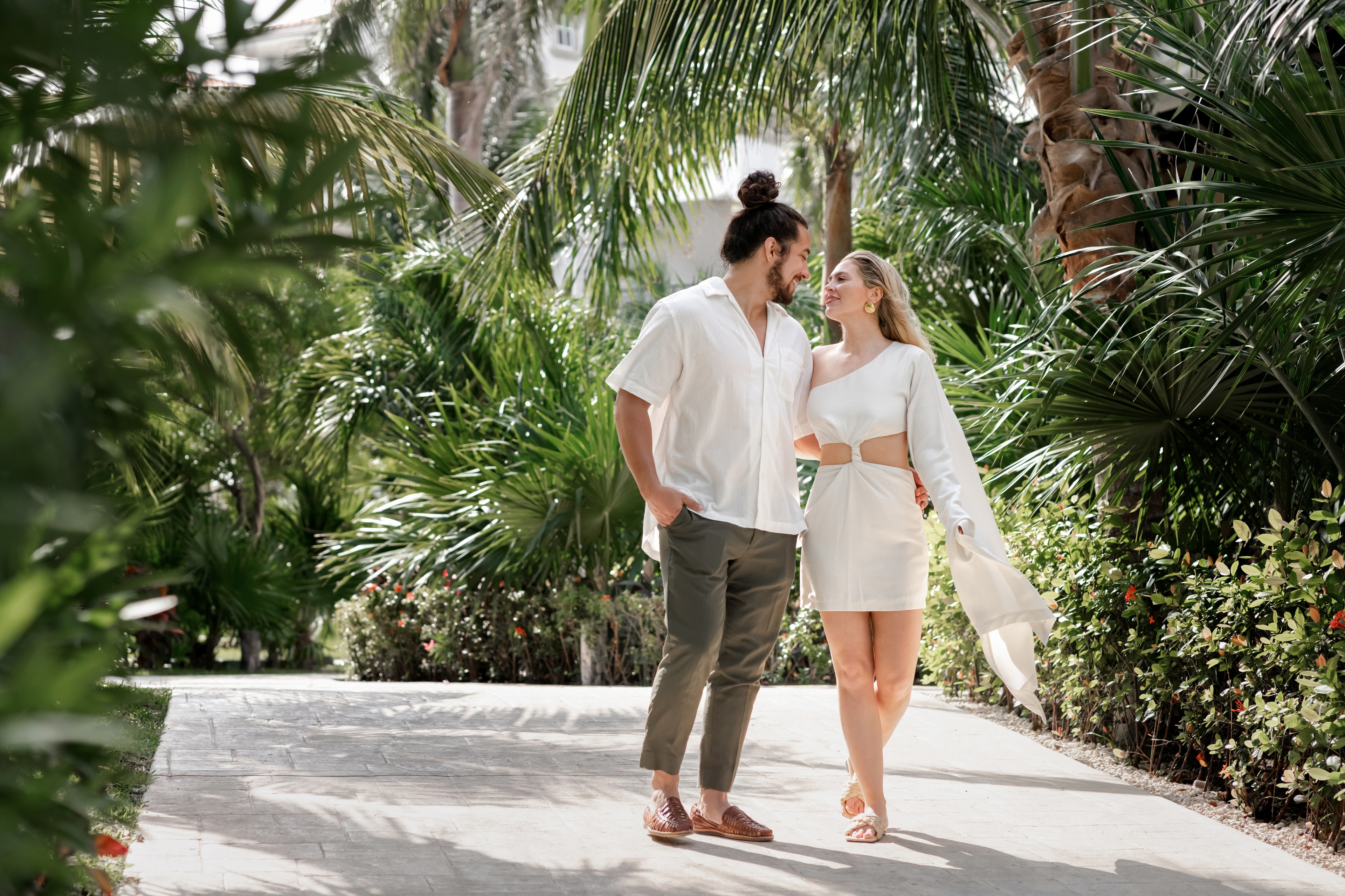 Surprise proposal photography at sunset on Cancun beach by IVAE Studios