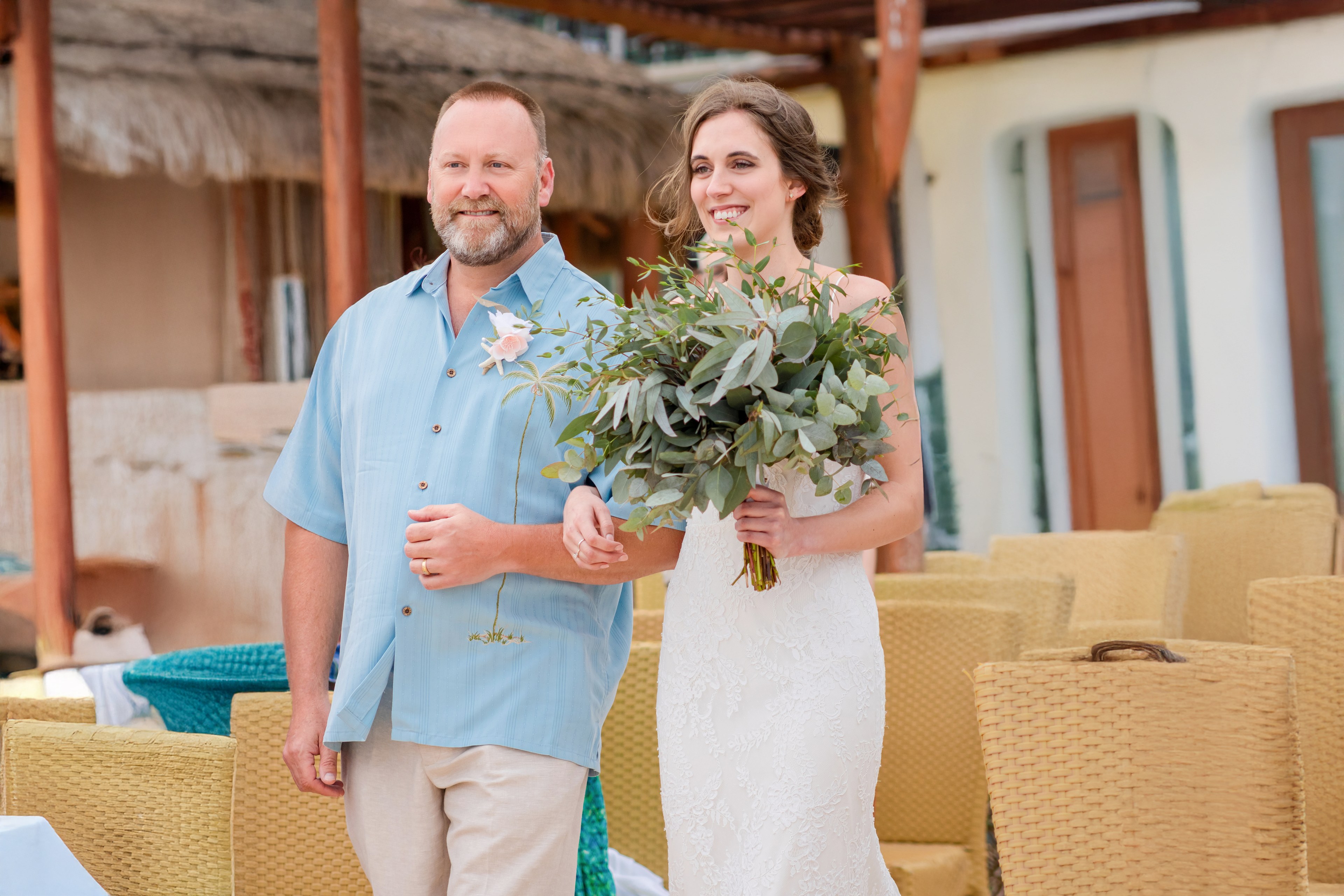 Detail of bridal hands holding bouquet