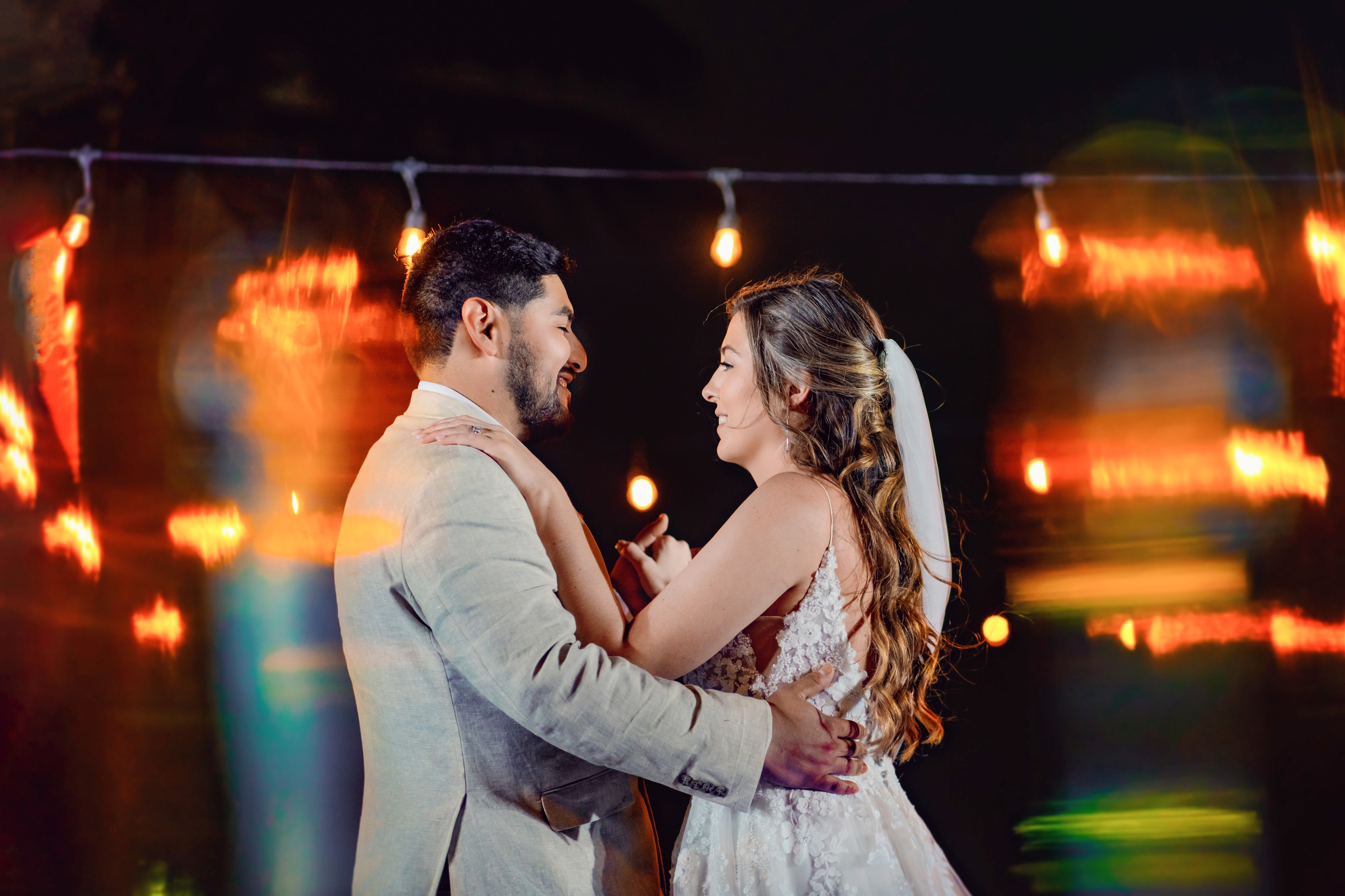 A bride photographed at golden hour in the Cancún Hotel Zone
