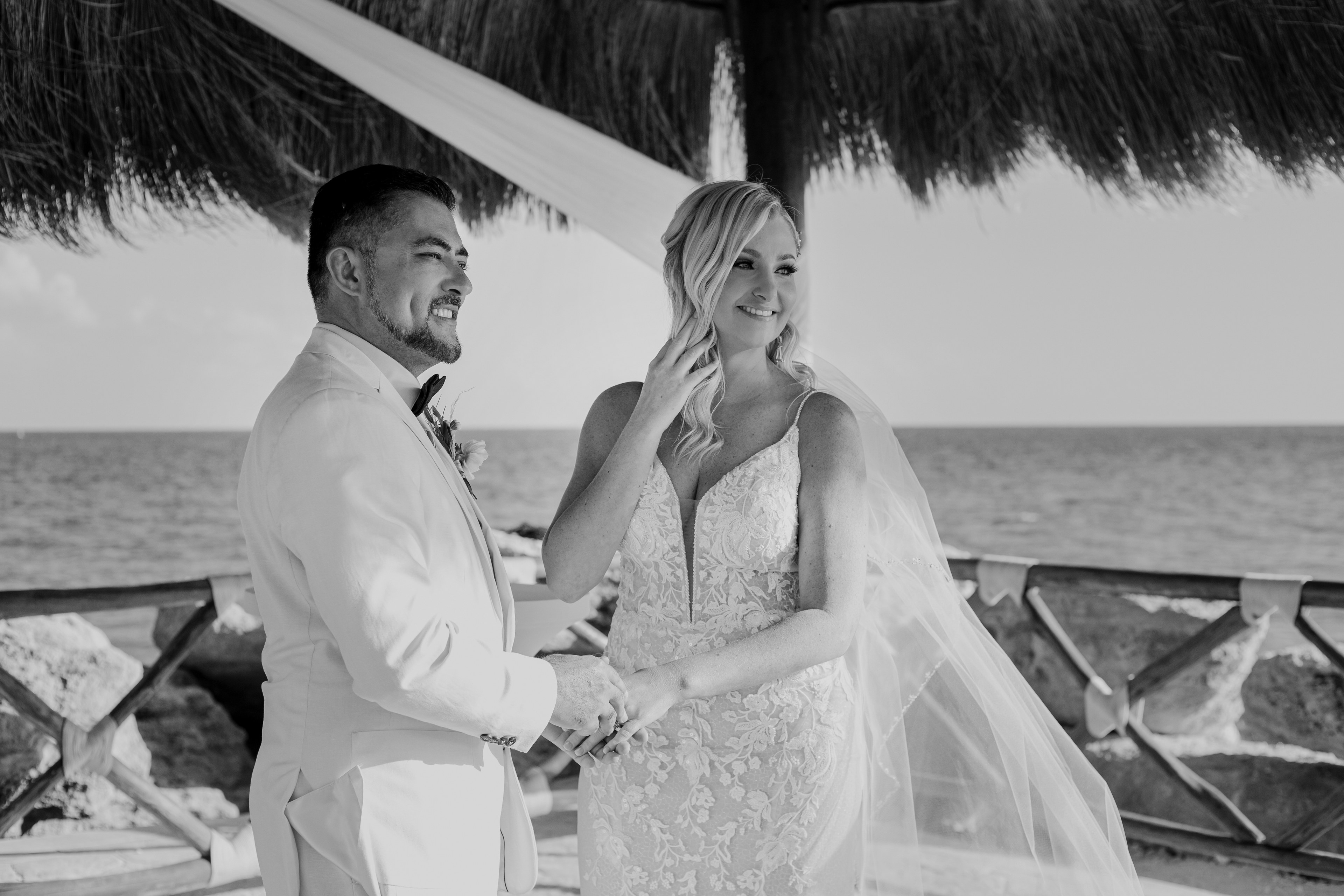 Wedding at the Cancún Hotel Zone with oceanfront altar by IVAE Studios