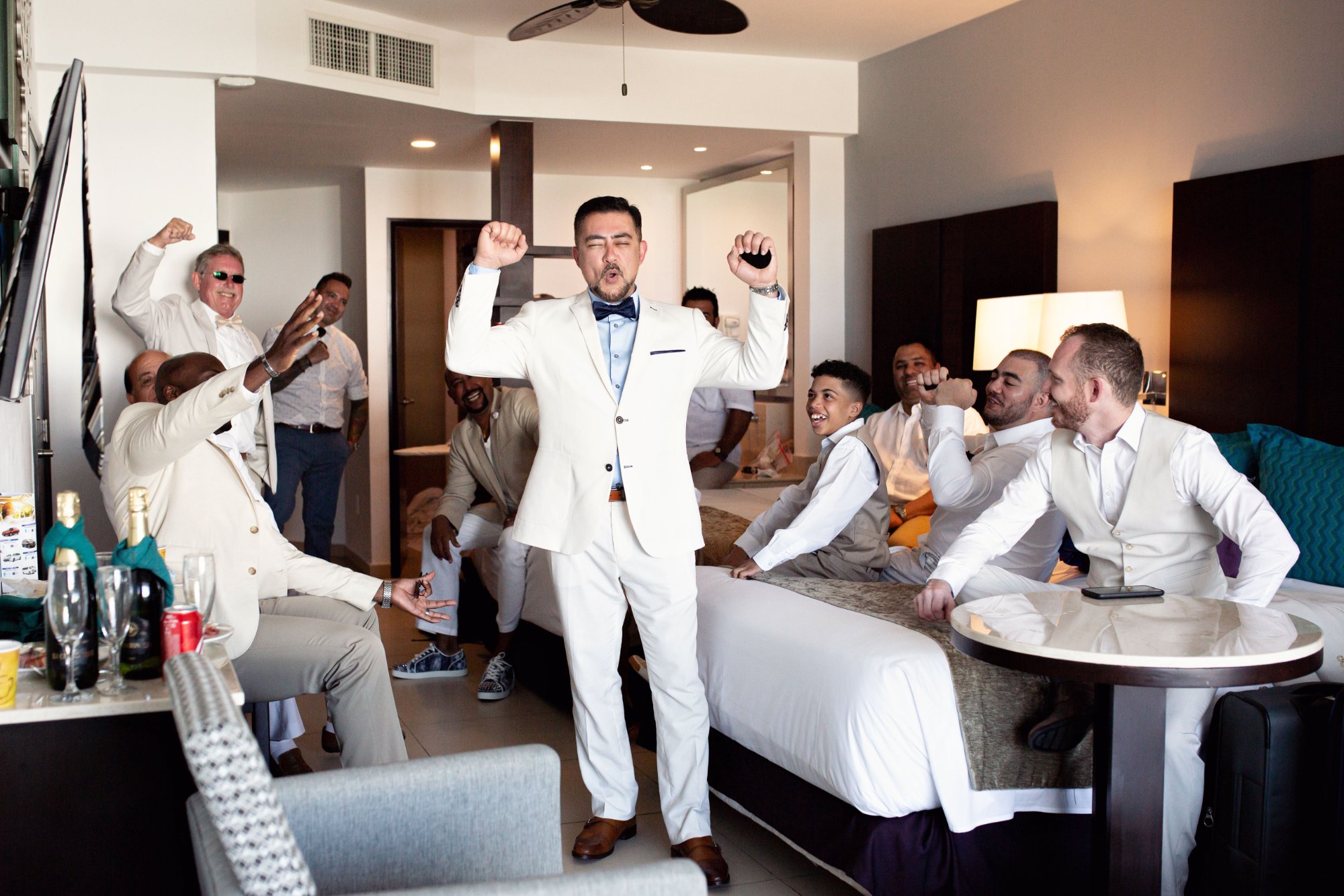 First look moment between bride and groom in resort garden Cancun by IVAE Studios